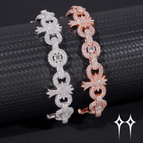 Pulsera con eslabones cubanos y cruz infinita con incrustaciones de diamantes en estilo hip hop.